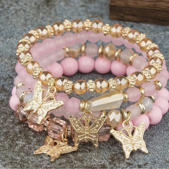 Jewelry - Woman’s Pink butterfly stretchy bracelets